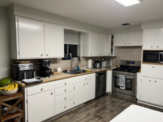 Finished white kitchen in use